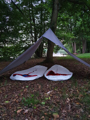 sleeping bag at lake side with tarp in uckermark