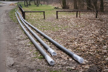 Plastic pipes on a construction site in the forest