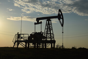 oil pump jack,well, pumping unit pumps oil
