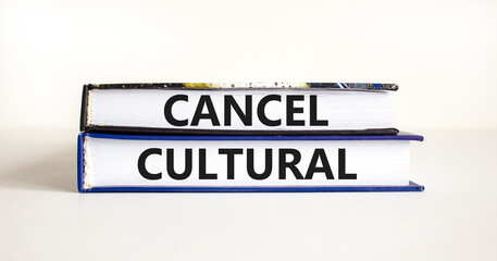 Cancel cultural symbol. Concept words Cancel cultural on books on a beautiful white table white background. Business and cancel cultural concept, copy space.