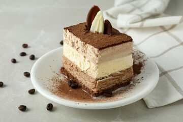 Concept of tasty dessert with Tiramisu cake, close up