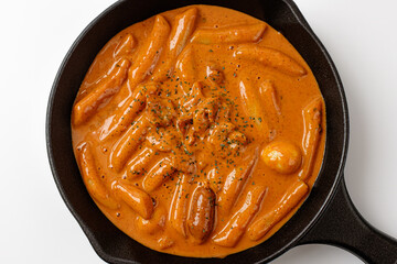 Rosé Tteokbokki on a white background