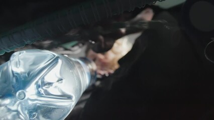 view from inside bag of woman taking medicine