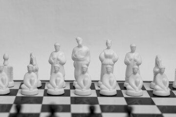 Ukrainian chess with Gogol's heroes on the board symbolizes battle and war