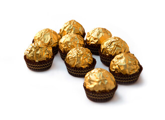 Candies wrapped in gold foil
