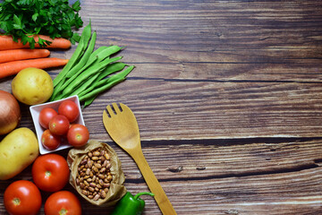 Zenith view. Assortment of healthy food on brown rustic wood. 