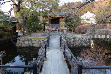 Japanese shrines and temples : a view of Benzaiten Subordinate Shrine in the precincts of...