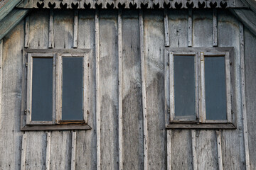 Fototapeta na wymiar Sunja, Croatia, April 20,2021 : Rustic style aged window at rural home wall.