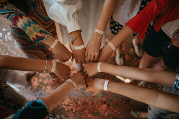 Joyful bride and bridesmaids having party at home. Team bride. Bride to be.