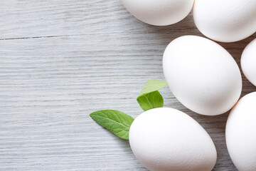 White eggs, one with easter rabbit ears, funny easter concept