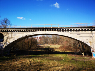 old bridge over the river and blue sky	