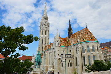 castle with orange roof and riders panorama hungary budapest sunny day summy