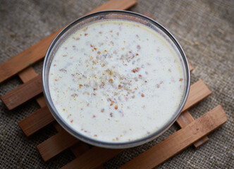 buckwheat with milk in a clear glass bowl
