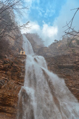 Full-flowing waterfall Uchan-Su in the Crimea. Horizontal image.