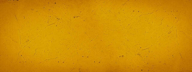 Yellow colored colorful grunge old aged retro vintage stone concrete cement blackboard chalkboard wall floor texture, with cracks - Abstract background banner panorama pattern design template