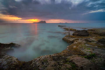 Cala Escondida view to the sea , at sunset , Ibiza 