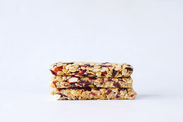 Almond , Raisin and oat protein bars on table 