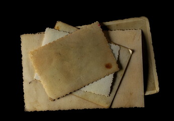 Blank old photo frame isolated on black  