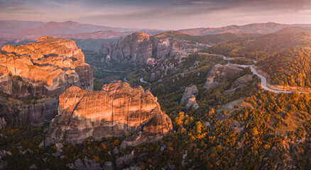 Atmospheric morning aerial panorama of the famous Meteora Monastery. Tourist and pilgrimage inspiration. Natural and religious wonders of Greece.