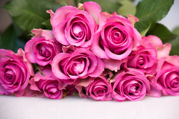 Bouquet of pink roses on white background. Flower background. Mothers Day, Wedding and Birthday concept.