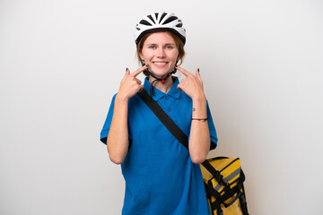 Young English woman with thermal backpack isolated on white background giving a thumbs up gesture