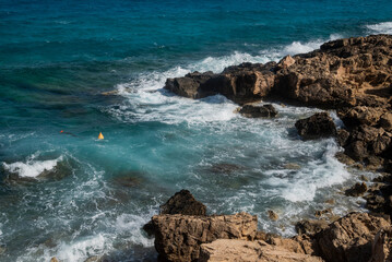 Fototapeta na wymiar coast in ayia napa in cape greco in cyprus by the sea with rocks