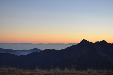 Mountain Silhouette at the Sunset. Italian Alps