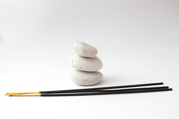 incense sticks with Stone on a white background