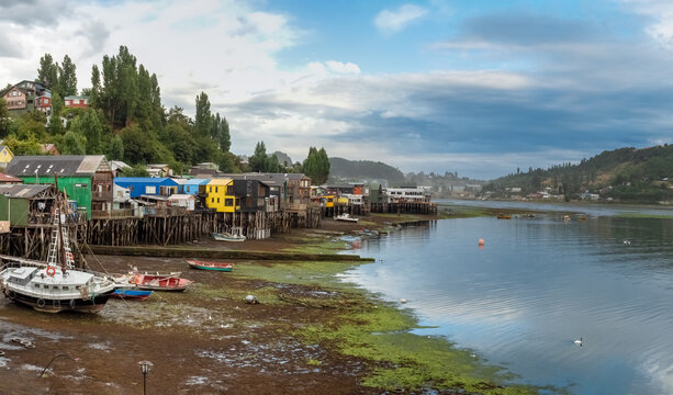 Fascinatinhg stilt houses (palafitos) on the fjord shores of the city of Castro, Chiloe Island, Chile