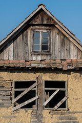 Sunja, Croatia, April 20,2021 :Abandoned traditional old wooden house. 