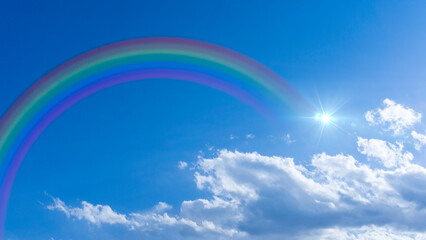 Bright blue sky with rainbow and sunshine_wide_03