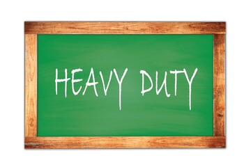 Obraz premium HEAVY DUTY text written on green school board.