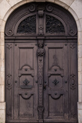 Munich, Germany - December 20,2021: Old Decorative Main Entrance Wooden Door.