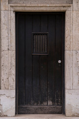 Munich, Germany - December 20,2021: Old Decorative Main Entrance Wooden Door.