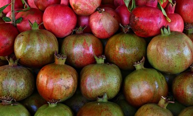 Italy: Pomegranates at the market.