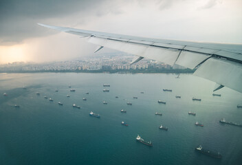 Flying over the Singapore Strait, final approach to Singapore Changi Airport.