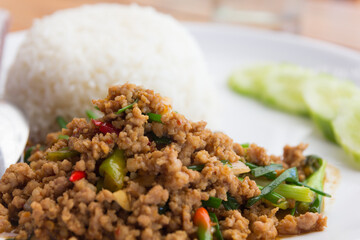 Close up rice with stir-fried pork and basil