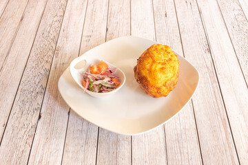 The stuffed potato is a typical fried food from several Latin American countries such as Chile, Colombia, Cuba, Peru and Puerto Rico.