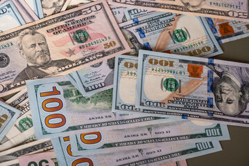 American dollars on olive color background. Finance and banking.