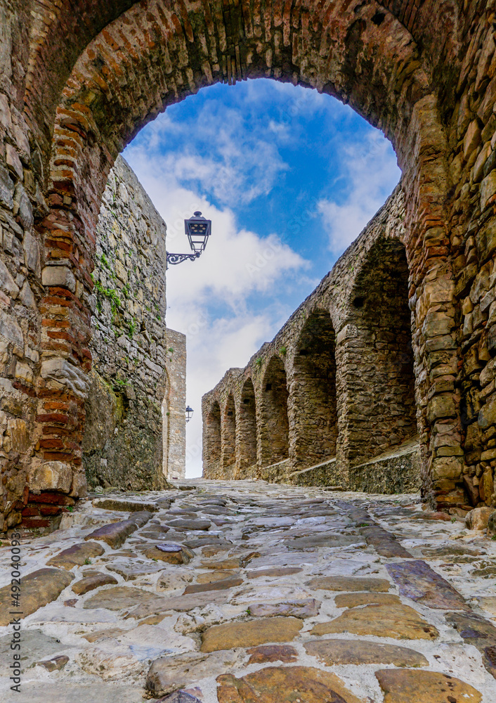 Sticker castle gate and walls in the historic city center of castello de castellar