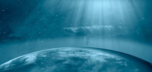 World oceans day concept -The blue whale swimming over the planet earth with a beautiful outher space "Elements of this image furnished by NASA"