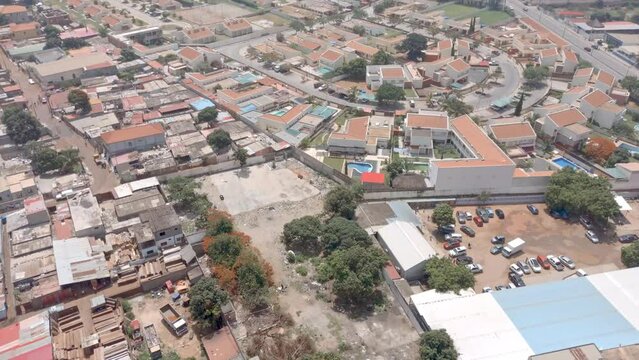 Aerial footage of Luanda. The difference between the well-being of a condominium and the famous underprivileged neighborhoods.