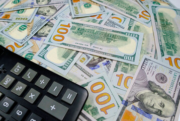 Calculator on the background of money. Accounting concept