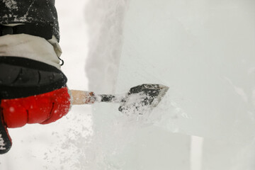 MINSK, BELARUS - 1 March, 2022: artist creates ice sculpture