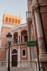Obraz premium Carrer del Palau, Valencia. Facade of archbishop's palace. Street. Historic 