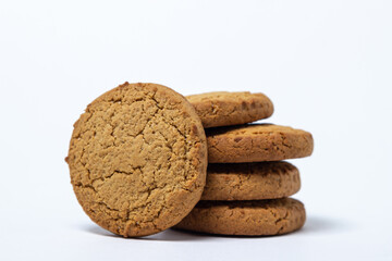 Oatmeal cookies on a white background. Light and tasty dessert. Healthy breakfast