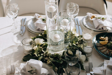 Table decor for a festive dinner by candlelight