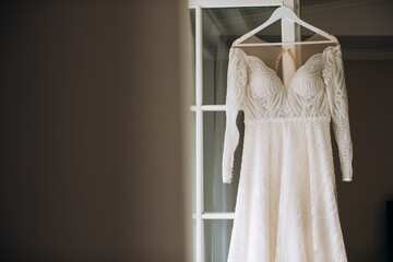 Beautiful white lace dress for the bride at the hotel