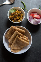 North Indian delicacy paratha or flat bread served with chana keema. Top view.	

