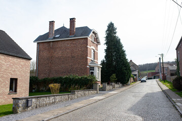 Fototapeta na wymiar Europe Belgium village street. Brick houses. Travelling around Europe. Florelle, Namur